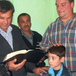 Steve Roy (right) and one of the Brothers in Christ CFIM supports were asked to pray a blessing over the children of a Romanian Family who was led to the Lord.